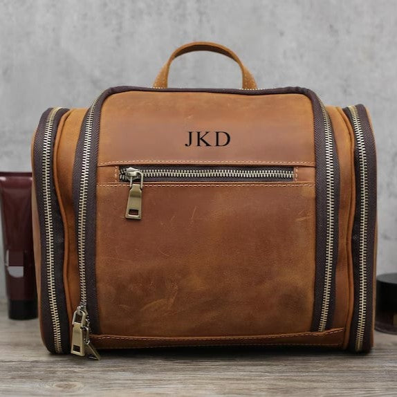 Custom toiletry bag from Yourstuffmade.com with multiple compartments, durable fabric, and personalized design.