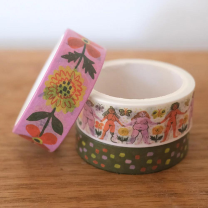 stack of washi tapes with marigold, female body, and dots print on it