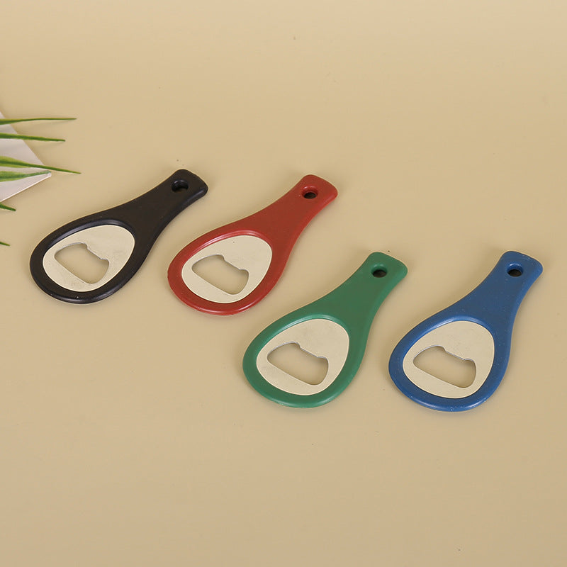 Four plastic bottle openers in different colors: red, blue, green, and yellow- yourstuffmade