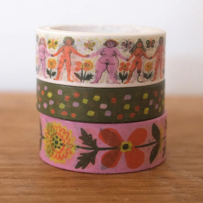 stack of three washi tapes with female bodies, dots, and marigold prints on it