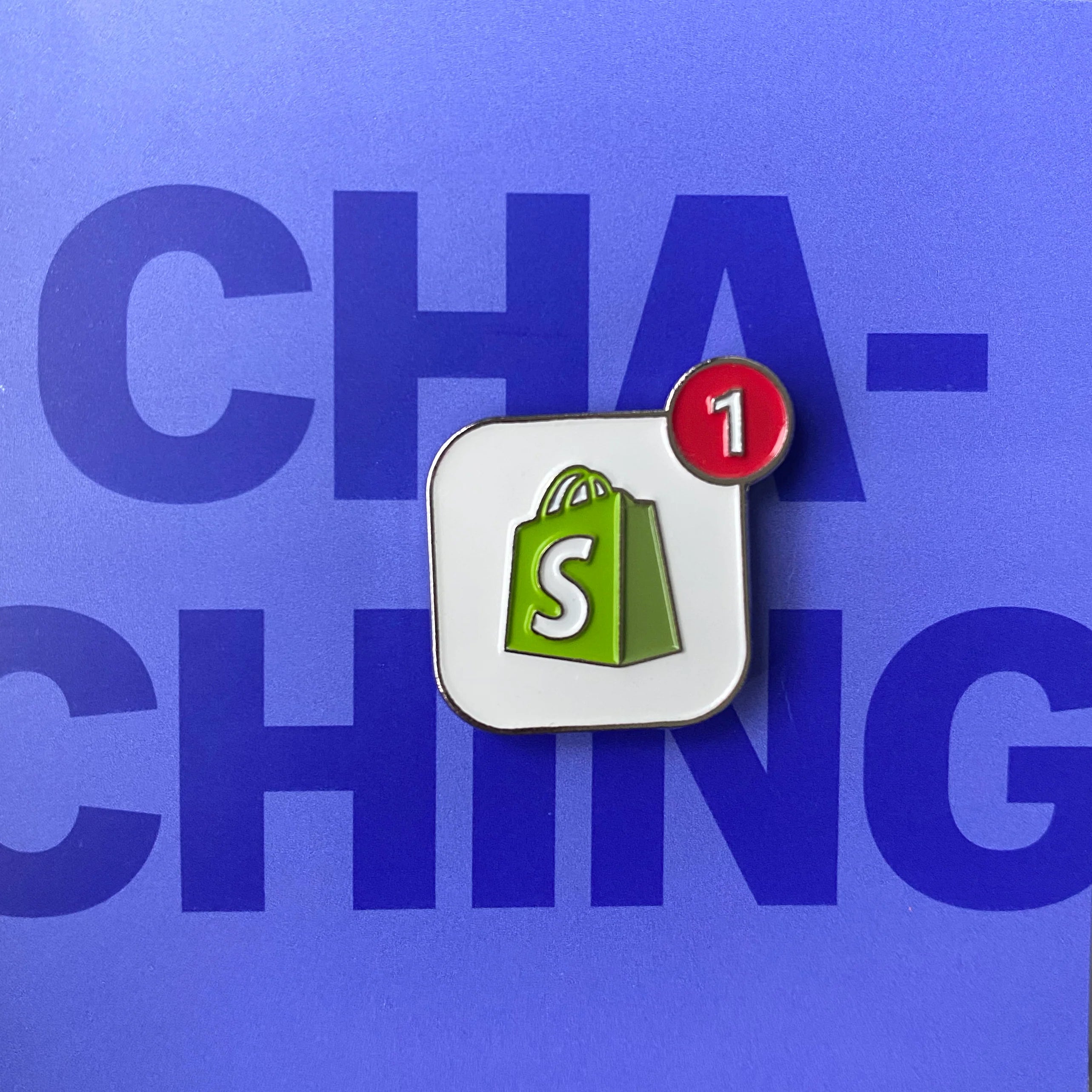 دبوس مينا يحمل علامة Shopify