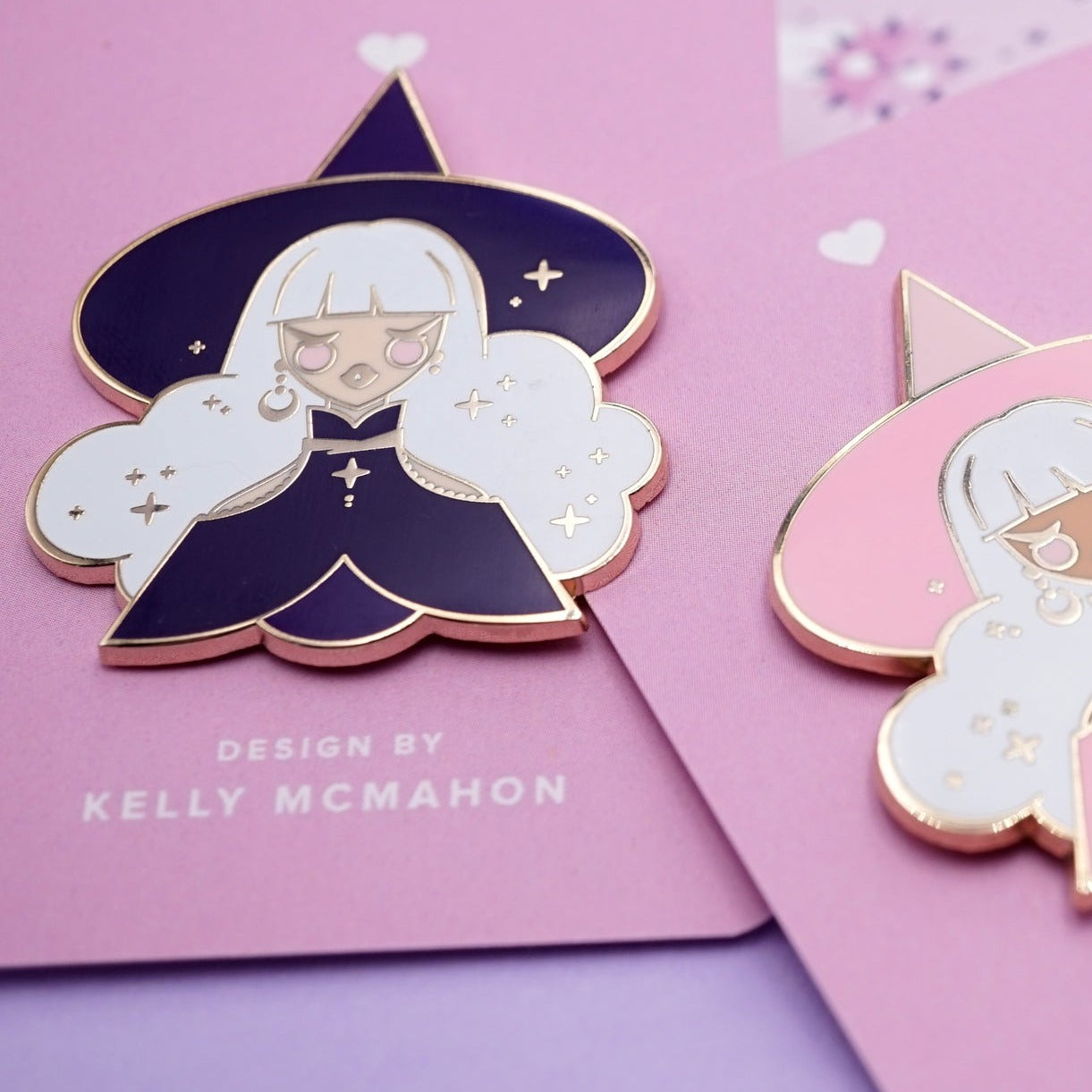 Witch Hard Enamel Pin on Pink Backing Card with "DESIGN BY KELLY MCMAHON" Text