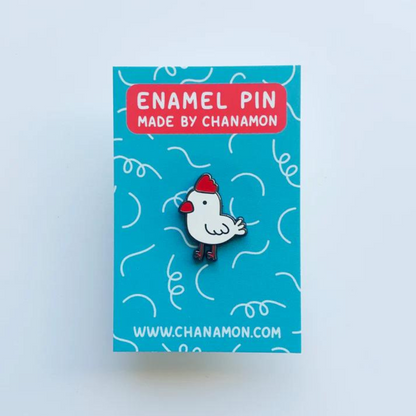Chicken Enamel Pin on Backing Card with "ENAMEL PIN MADE BY CHANAMON WWW.CHANAMON.COM" text