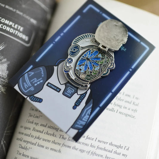 Enamel pin featuring an astronaut design by Allen & Unwin, displayed on a white background.
