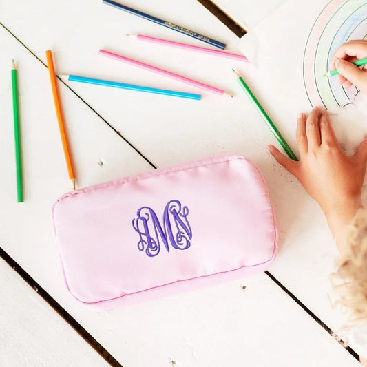 Custom pencil case by Yourstuffmade.com with colorful fabric design, zipper closure, and multiple compartments for stationery.