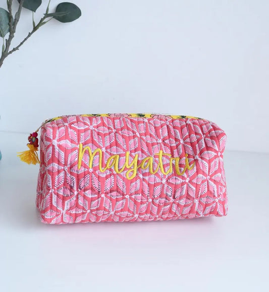 Custom toiletry bag from Yourstuffmade.com with multiple compartments and durable fabric, ideal for travel and organization.