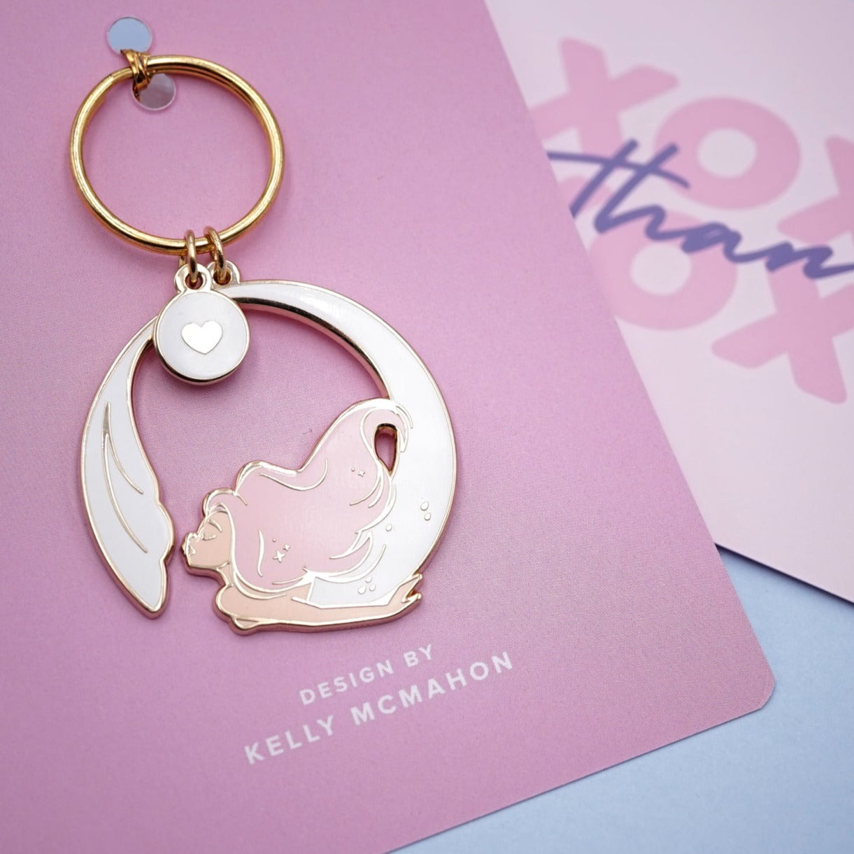 Mermaid Keychain in a backing card with "DESIGN BY KELLY MCMAHON" text